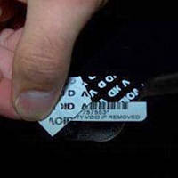 Tamper resistant asset labels